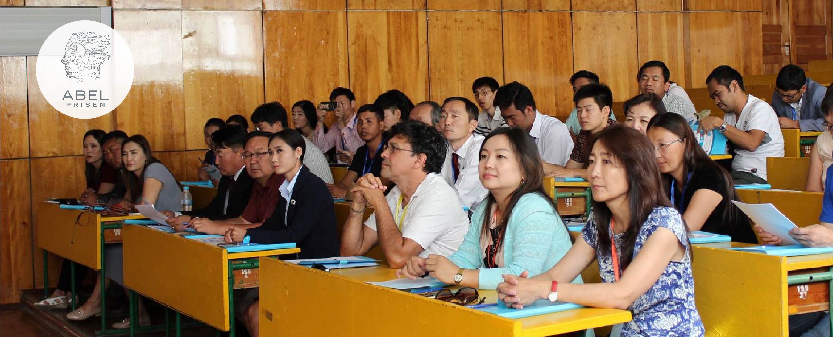 Conference participants attending a lecture.