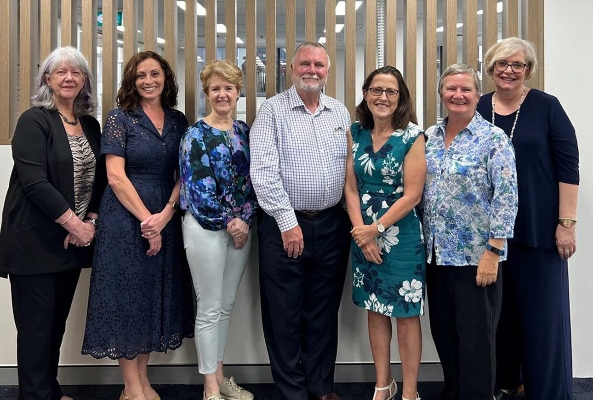 A photograph of seven members of the ICME-15 Local Organising Committee.