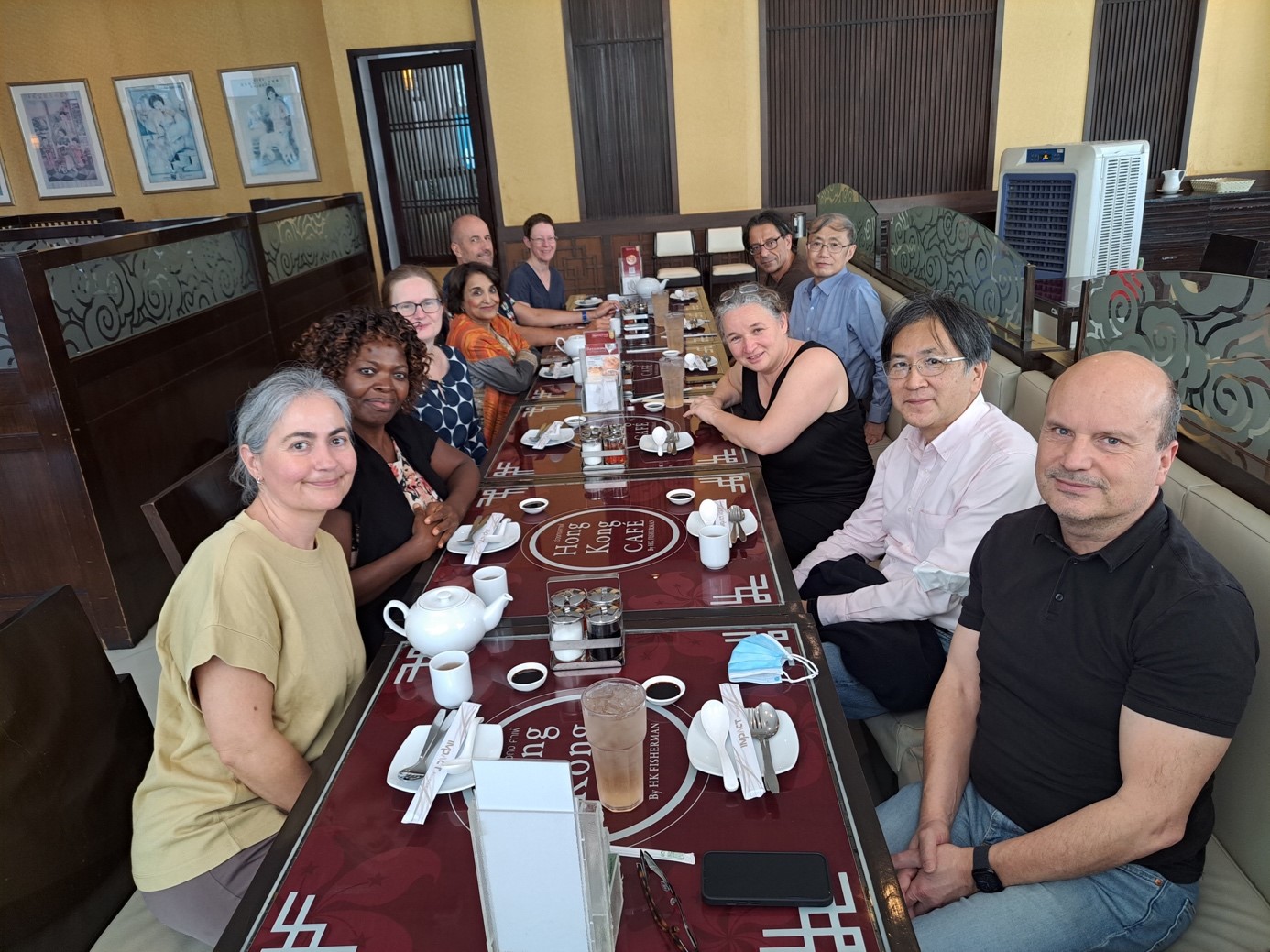 Members of the ICME EC at the EC meeting in Bangkok in February 2023: from left to right: Núria Planas, Mercy Kazima, Lena Koch (ICMI Administrative Manager), Anjum Halai (ICMI Vice President), Jean-Luc Dorier (ICMI Secretary General), Merrilyn Goos (ICMI Vice President), Paolo Piccione, Frederick K. S. Leung (ICMI President), Susanne Prediger, Hiraku Nakajima (IMU President), Christoph Sorger (IMU Secretary General).  Three members were participating online: Marta Civil, Jill Adler and Patricio Felmer.