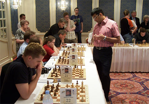 Chess master plays simultaneous exhibition against locals