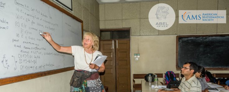 Lecturer Sylvia Wiegand teaching using a whiteboard